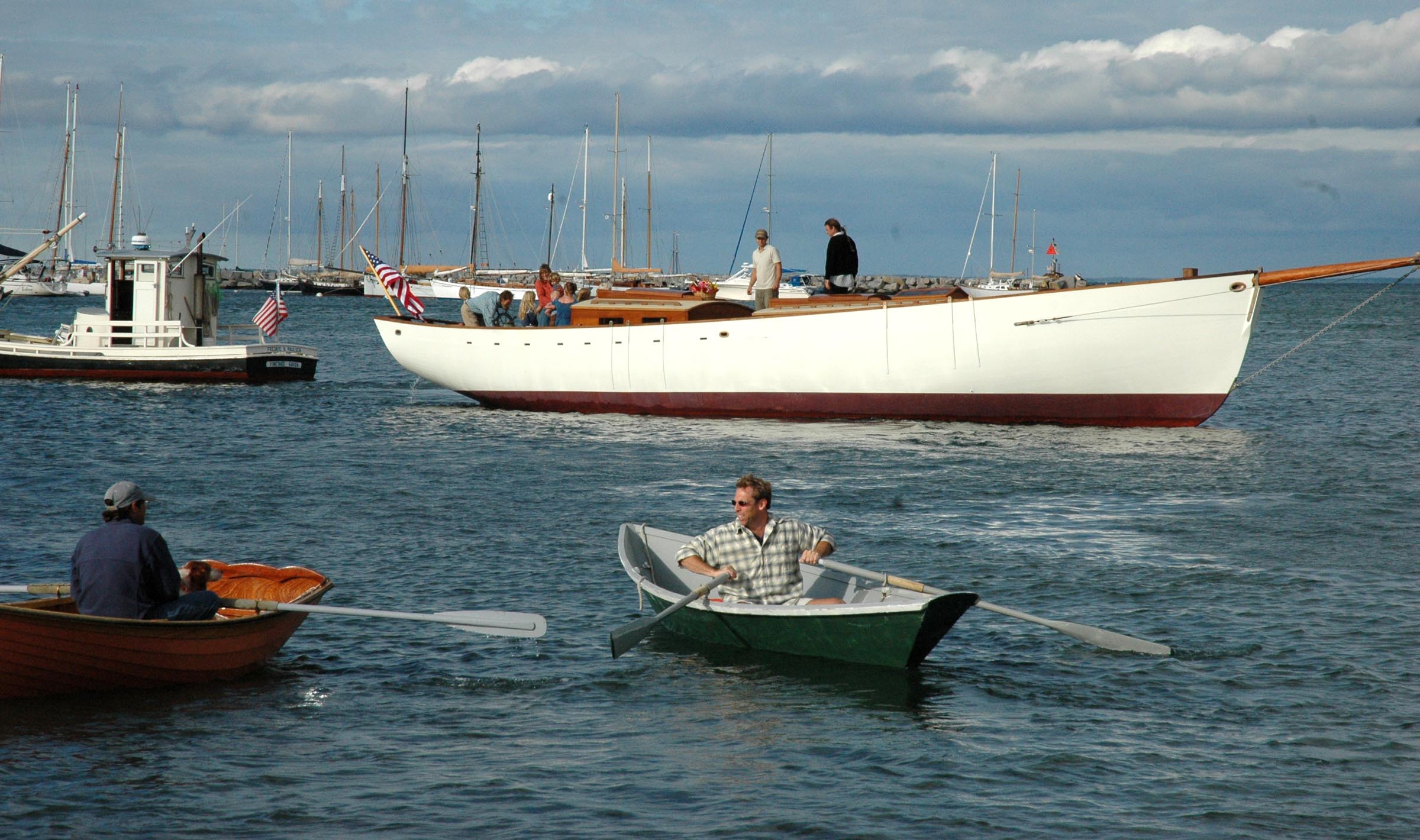 rowing to the sailboat