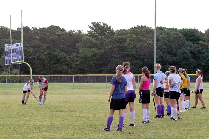 athletes practicing soccer field