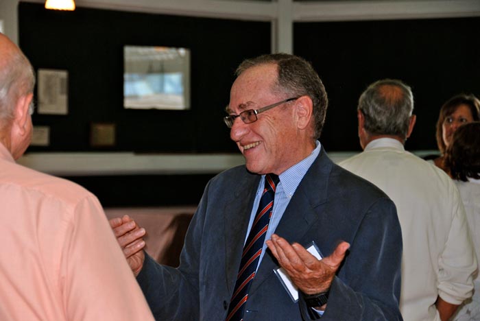 neck tie suit eye glasses man talking Alan Dershowitz