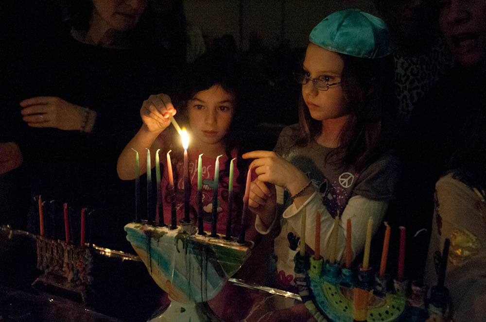 Beginning with the light of one candle.