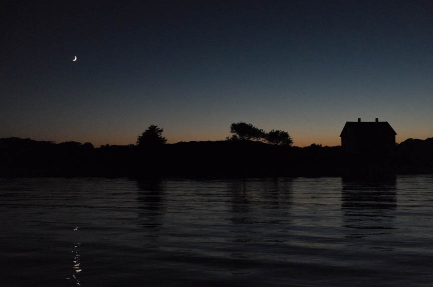 Setting crescent moon.