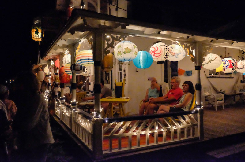 Porches were lit with oriental lanterns.