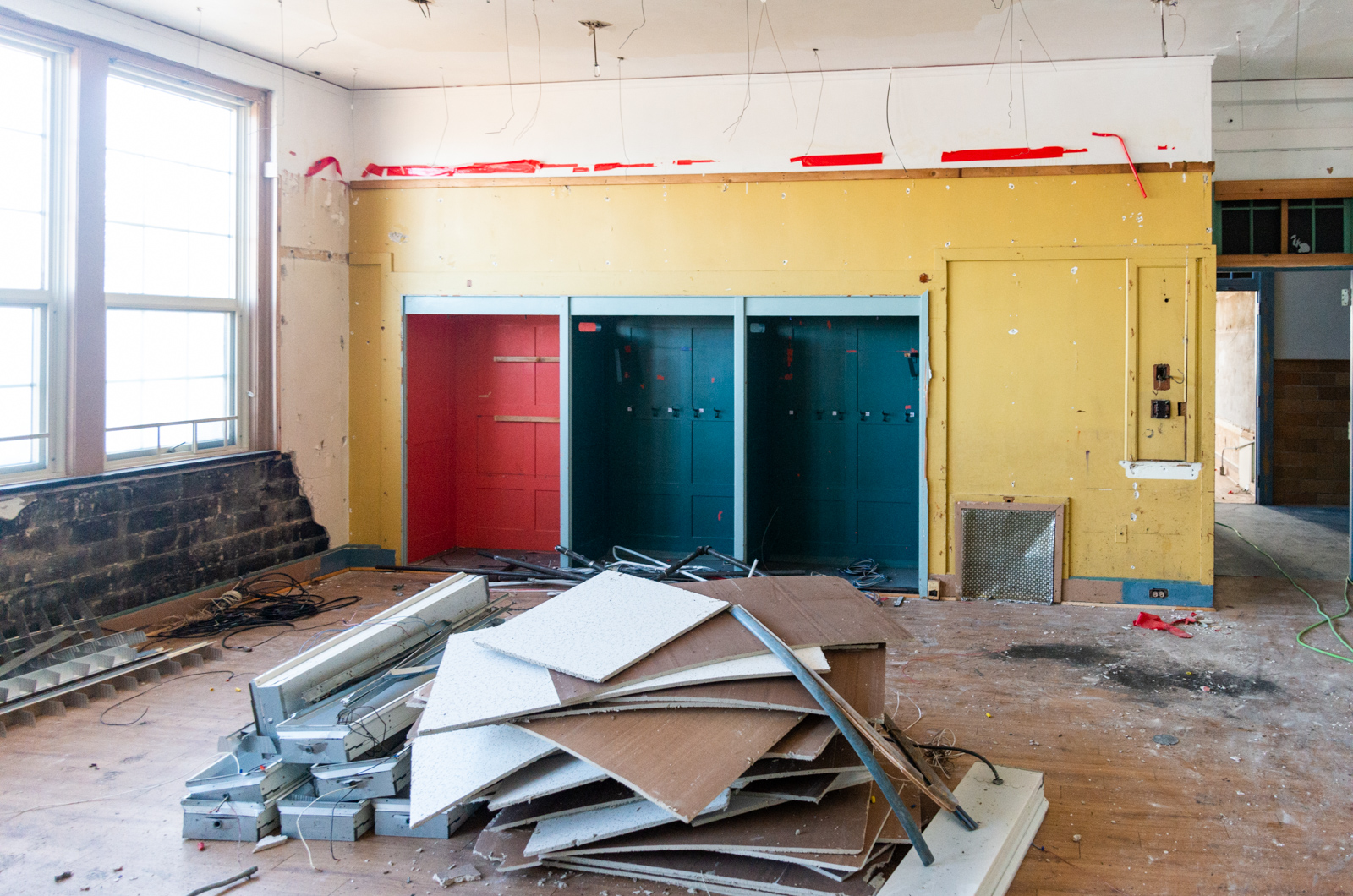 Various materials are stripped and organized before the real demolition begins on the second floor.