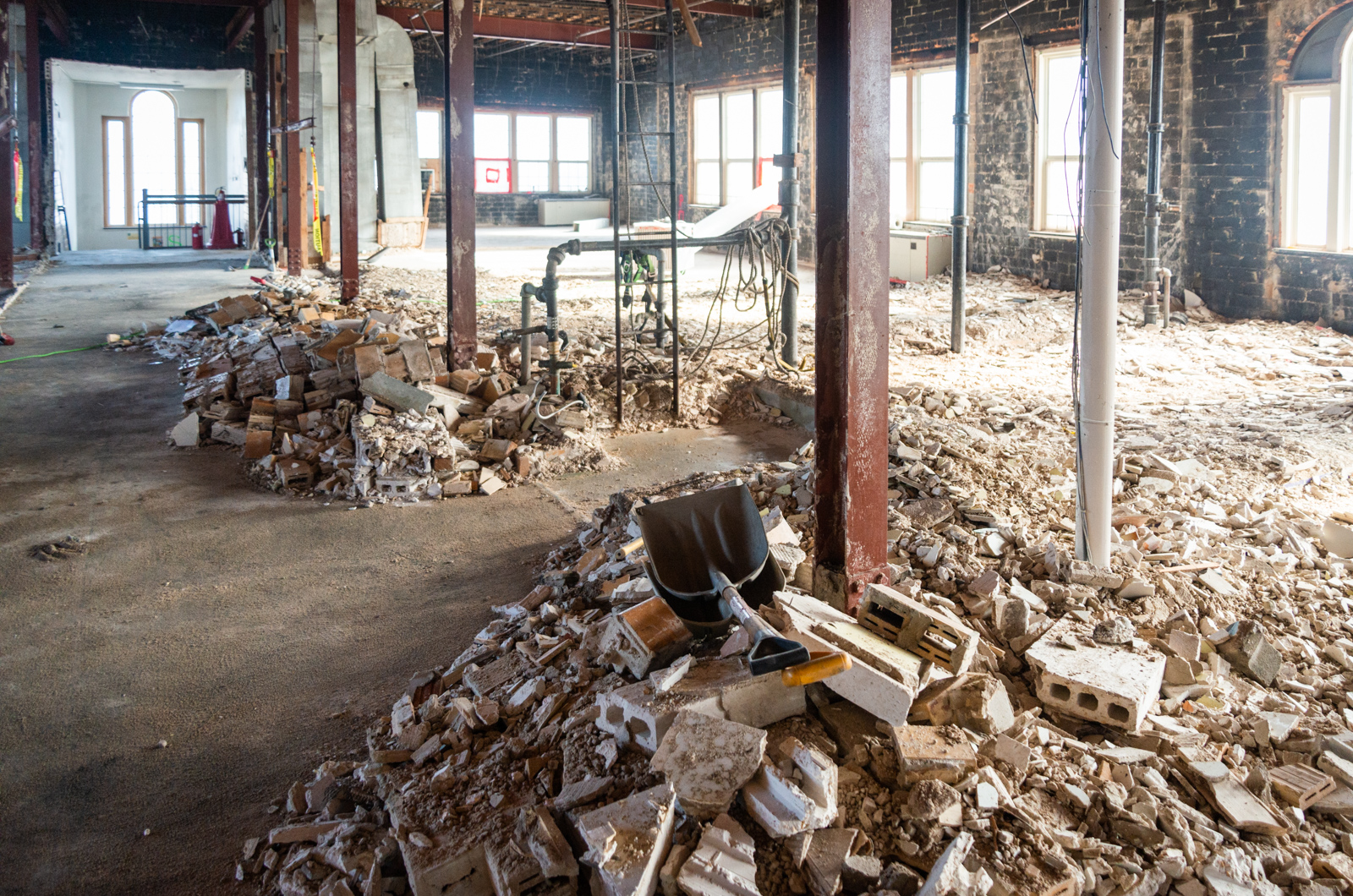 Demolition workers are clearing areas of the third floor.