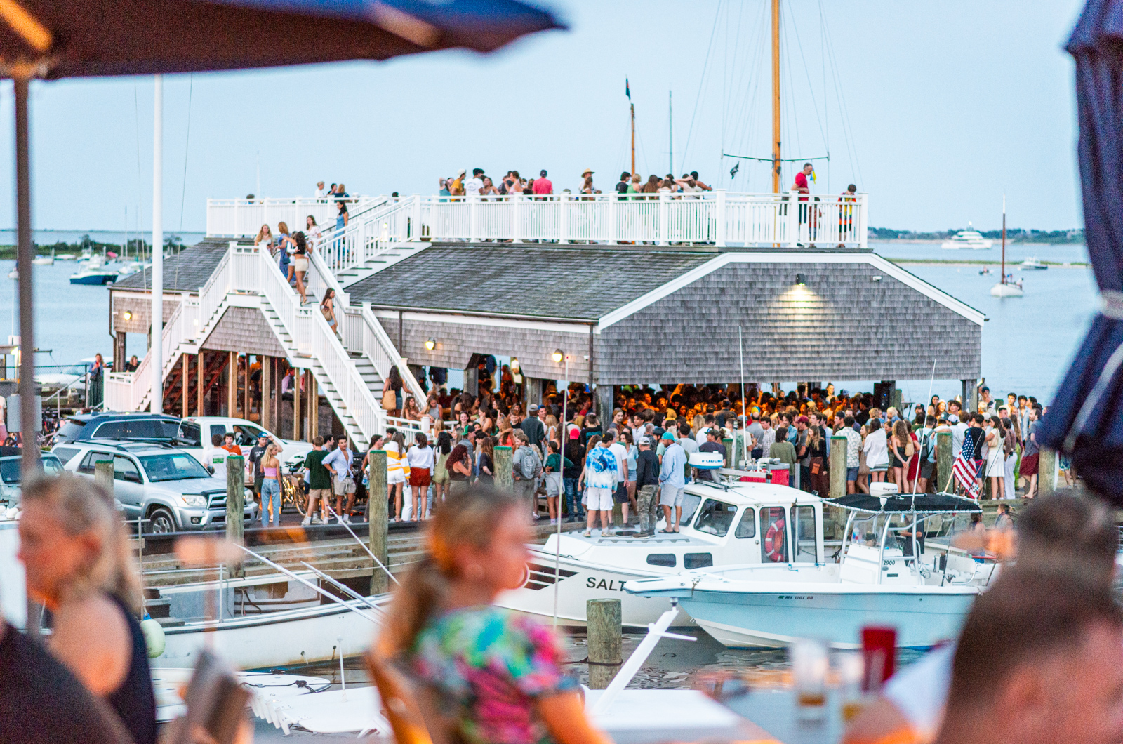 The mostly young crowd gathers on Tuesday evenings at Memorial Wharf in Edgartown.