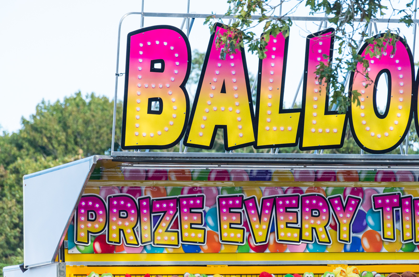 The Carnival buzzes and hums.
