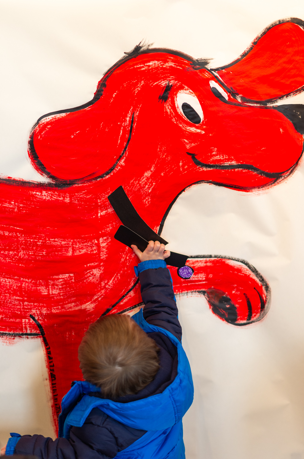 Guests could play "pin the collar on Clifford."