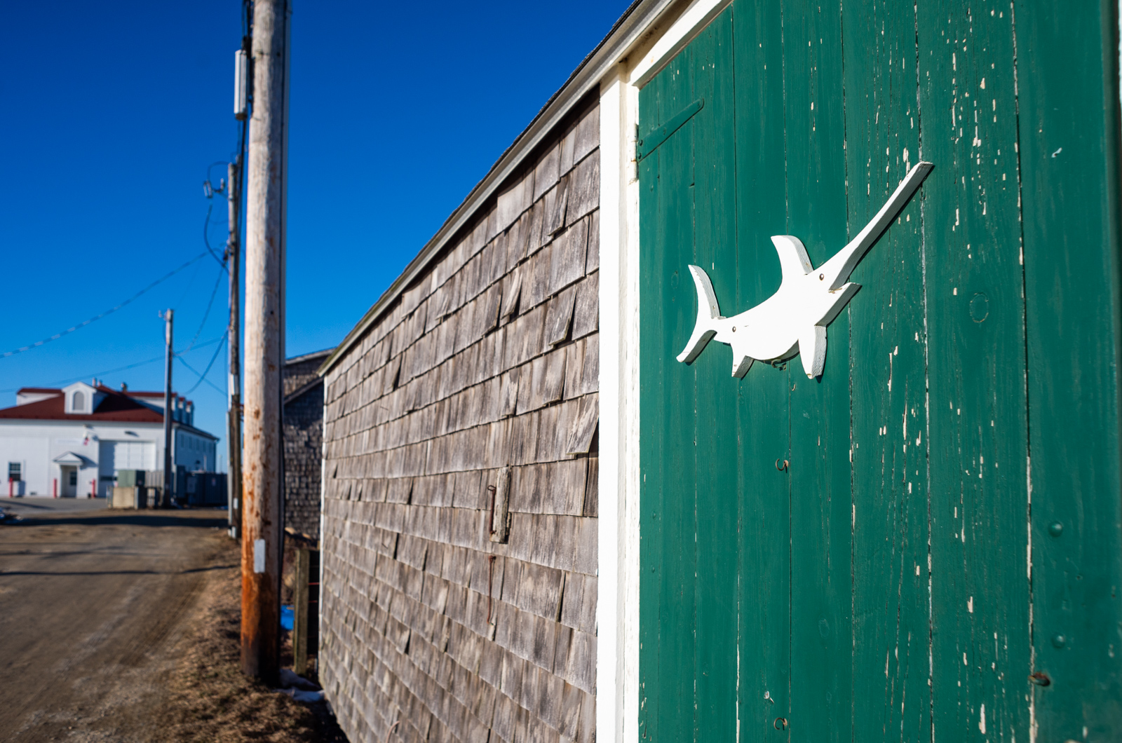 Fisherman's shacks line the way to the Coastguard station.