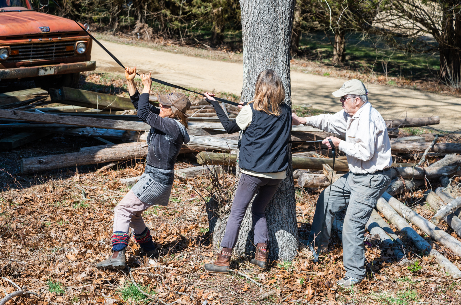 (left to right) Rebecca Sanders, Anna Greene, Bob Woodruff pulling the owl box into place.