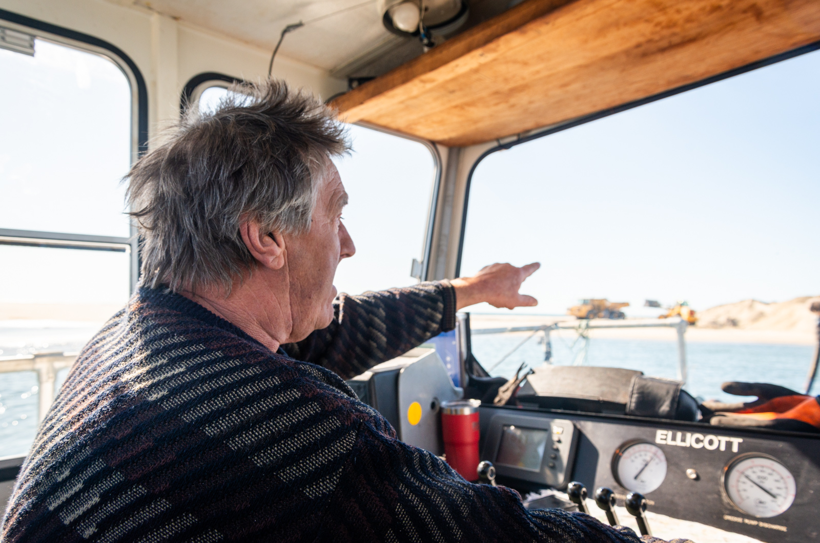 Donnie Benefit explains the inner workings of the dredge operation.