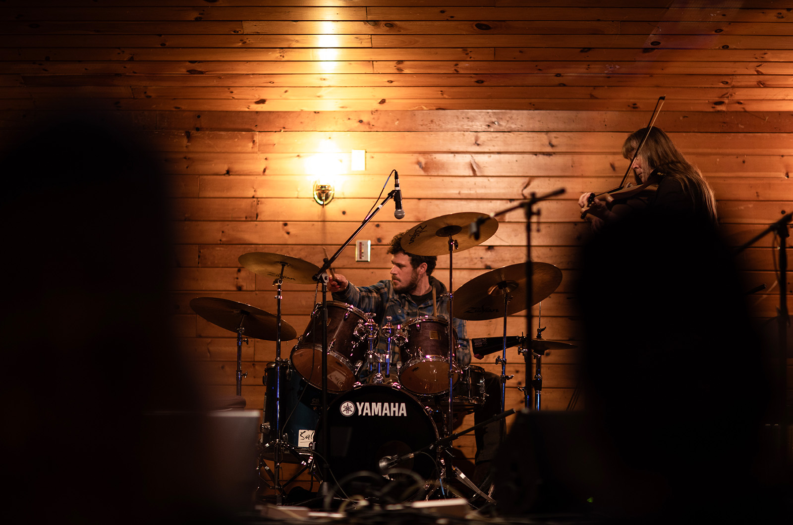 Benham Robinson on the drums, Nancy Jephcote on the violin.