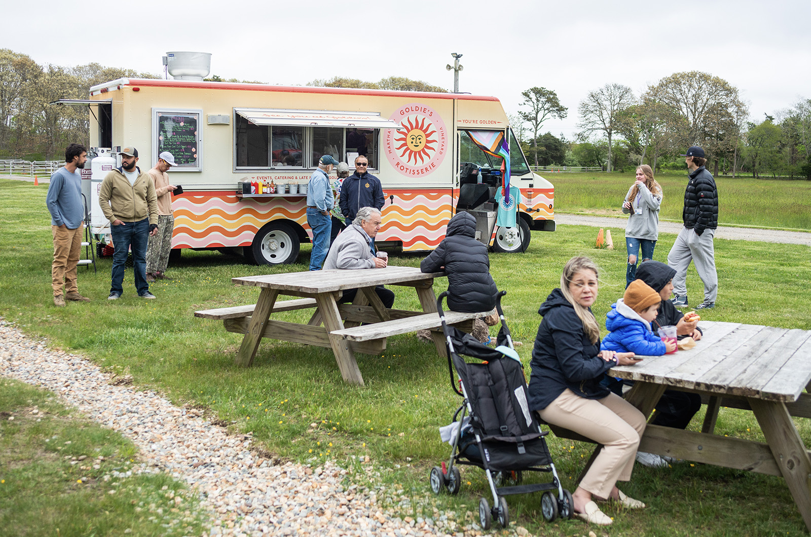 Goldie's Rotisserie food truck provided refreshment outside.