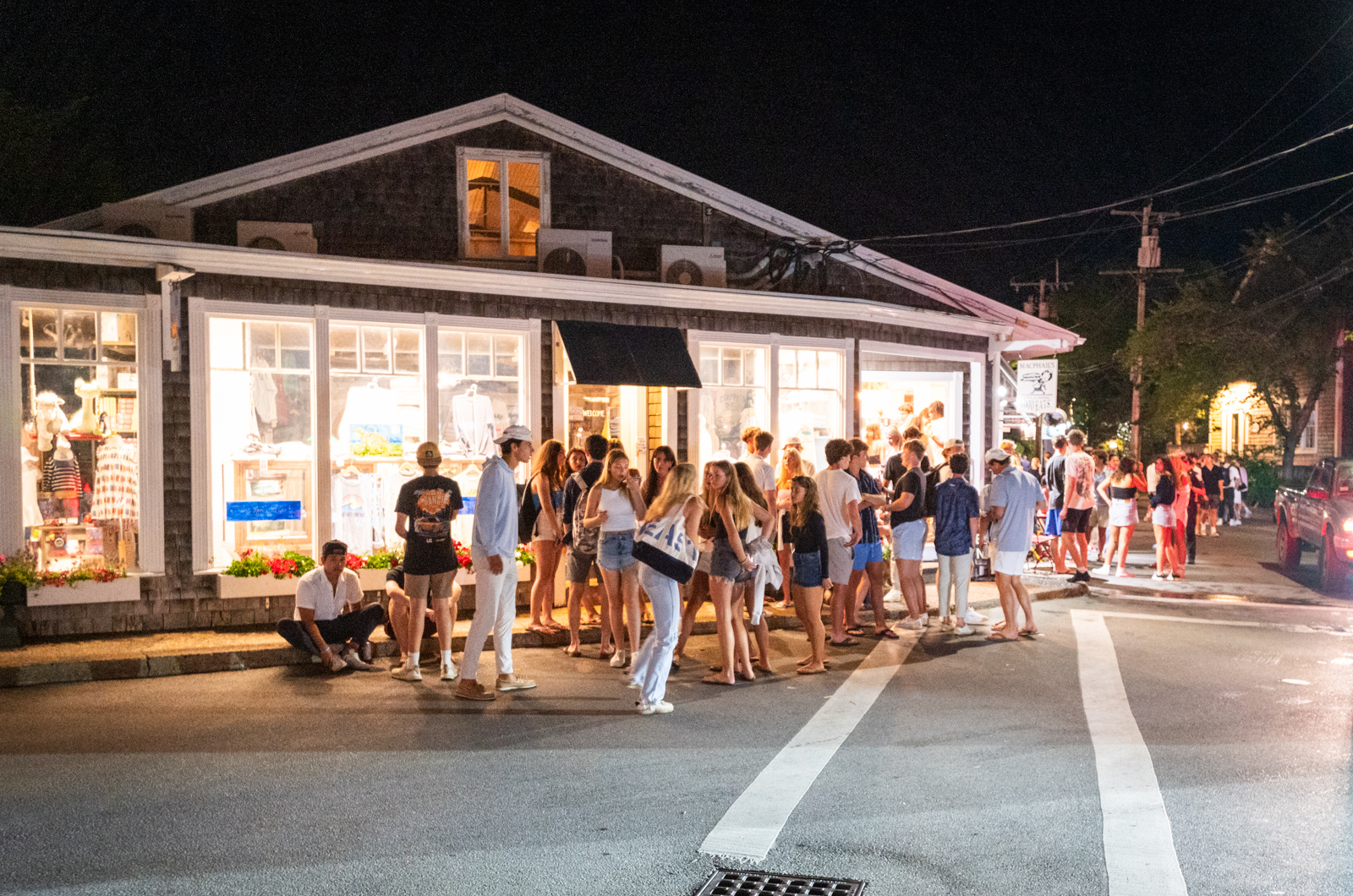 Dancers flood the shops on Dock Street.