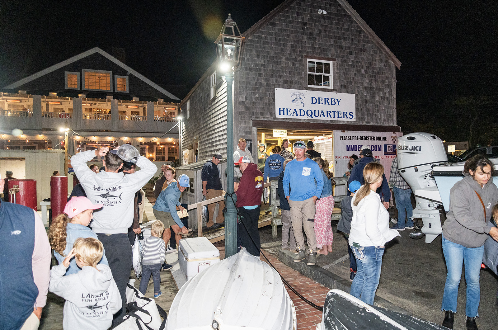 Participants line up on Saturday night to weigh in Albies.