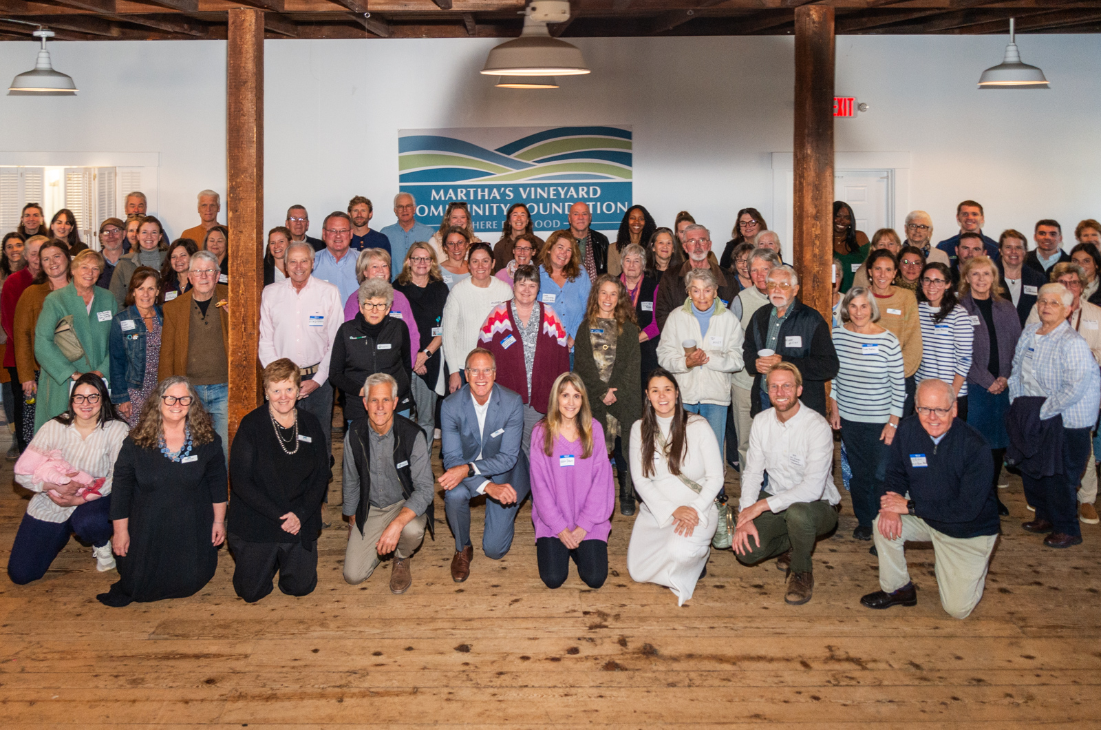 Grant recipients gather together downstairs at the grange hall.