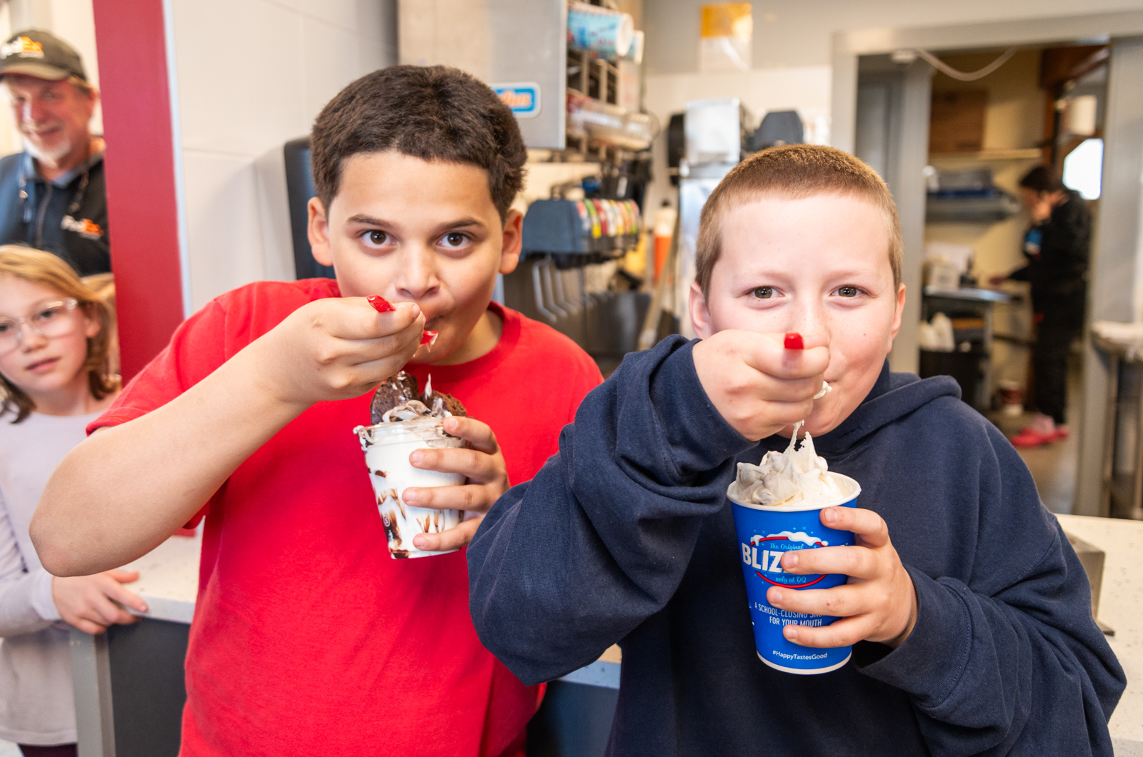 Teadan Brown and Ben Brown enjoy their first DQ Blizzards of the year.
