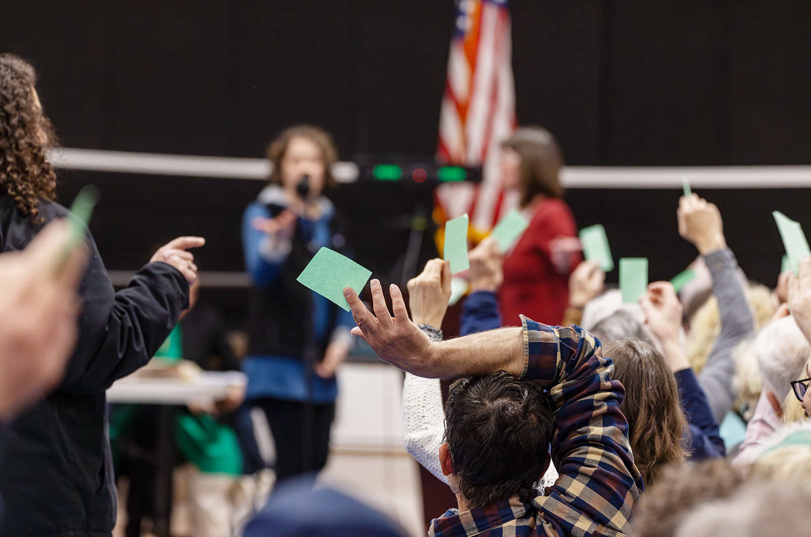 Voting with cards in West Tisbury.