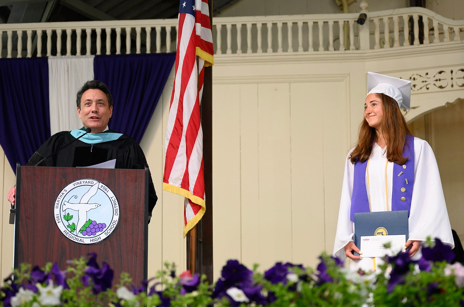 Richie Smith presents the superintendent’s outstanding student awards. to Avery Mulvey.