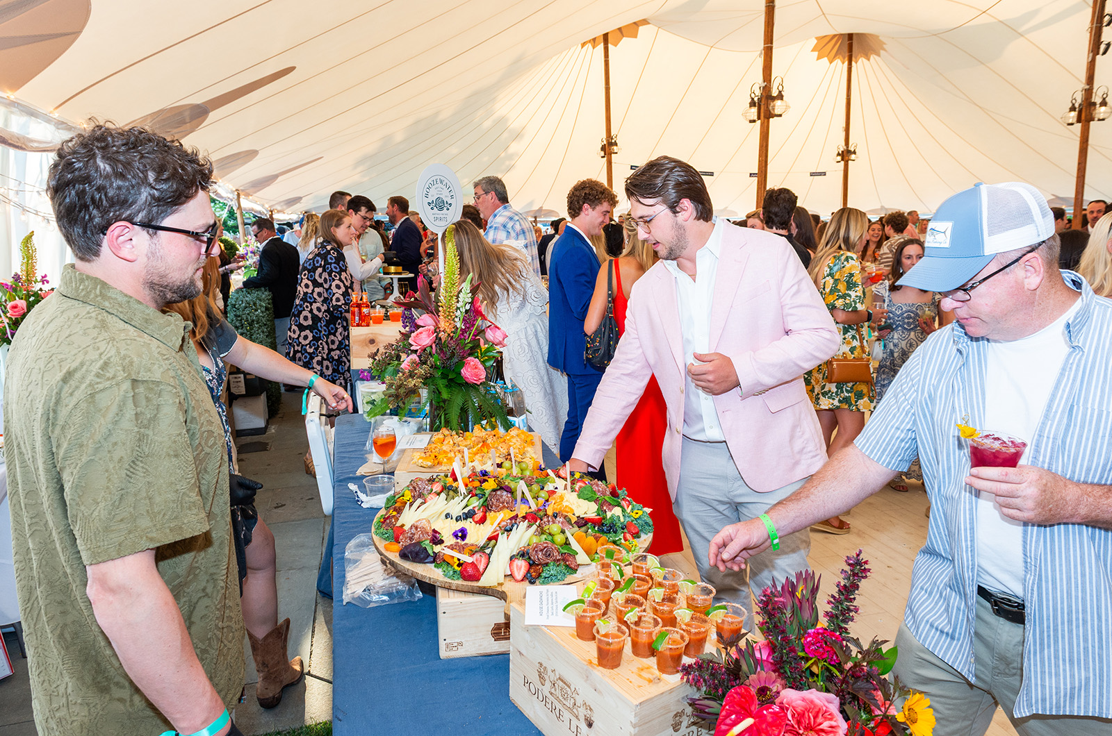 Guests sample the food at the Rosewater Market booth.