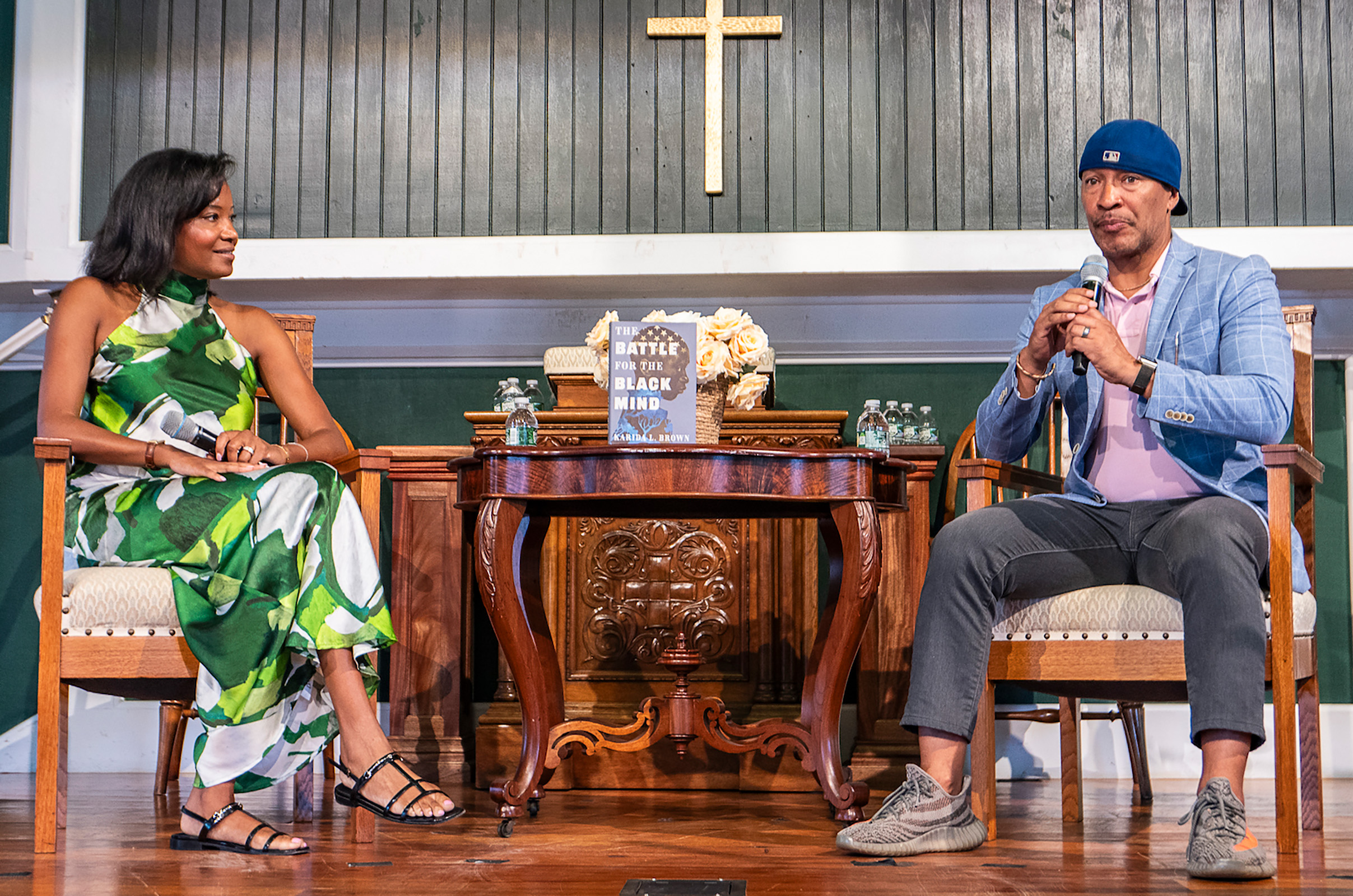 Karida Brown, left, talks about her book with Shane Evans.