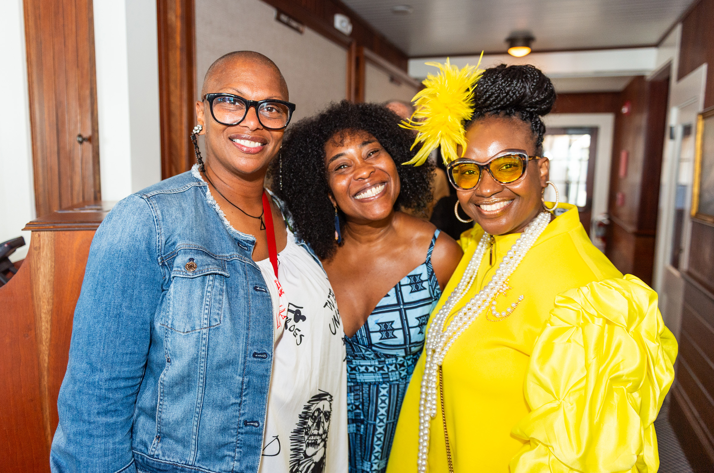 [l-r] Tre Smith, Quiana Higgins, and Arlene Kelly in line for the Gospel Brunch.