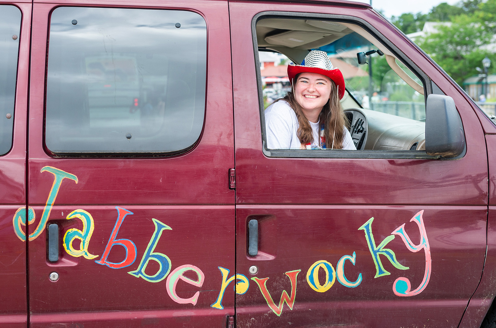 Stacie Hanson awaiting campers in the van.