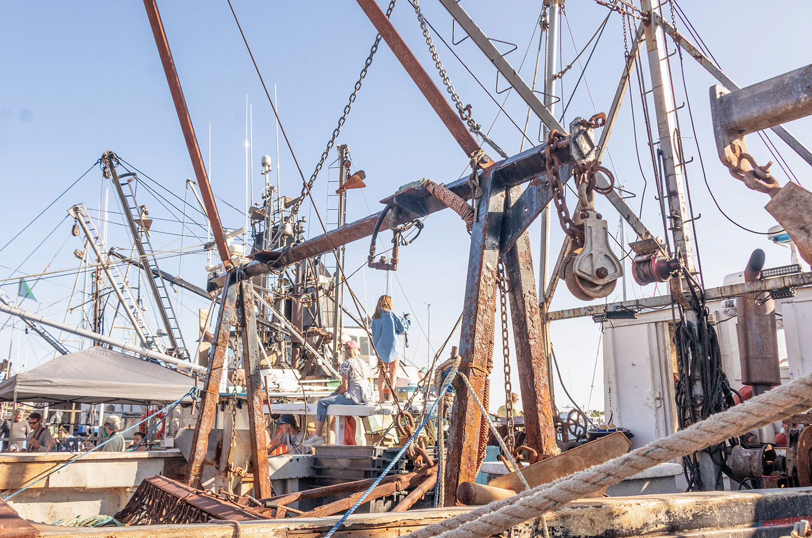 Fishing vessels line the dock to greet the visitors.
