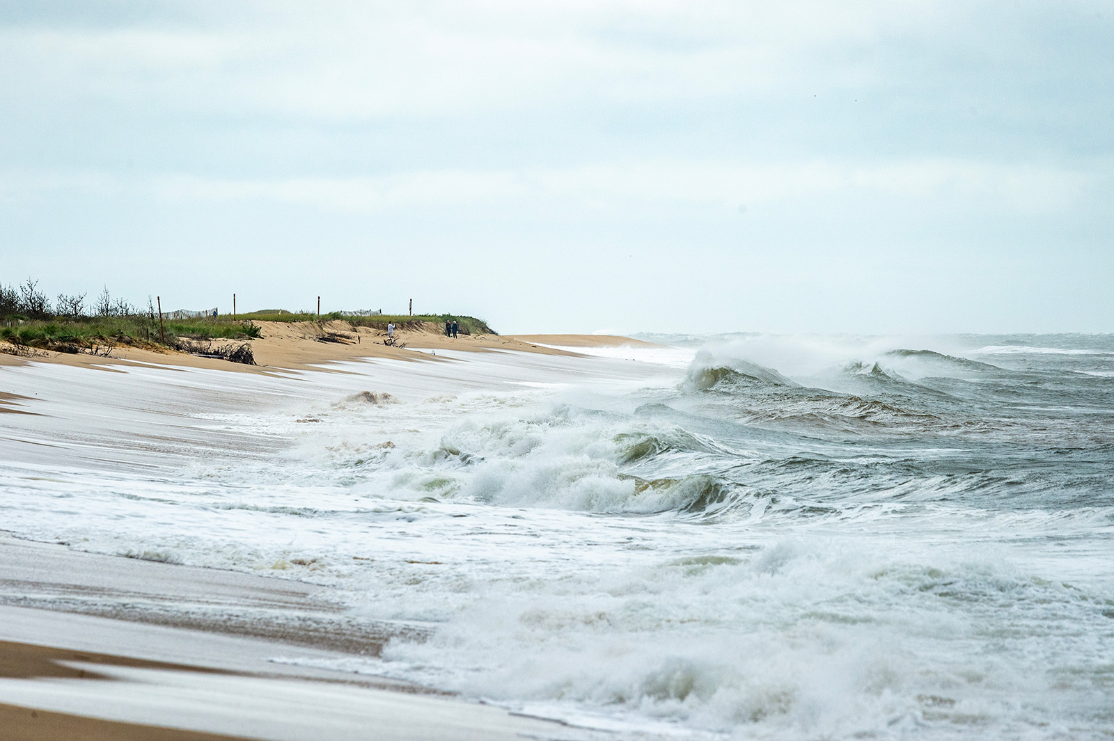 Storm surge pushes up on the beach.