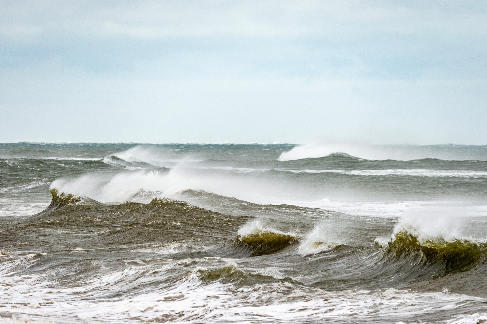 Breakers roll in out of the south.