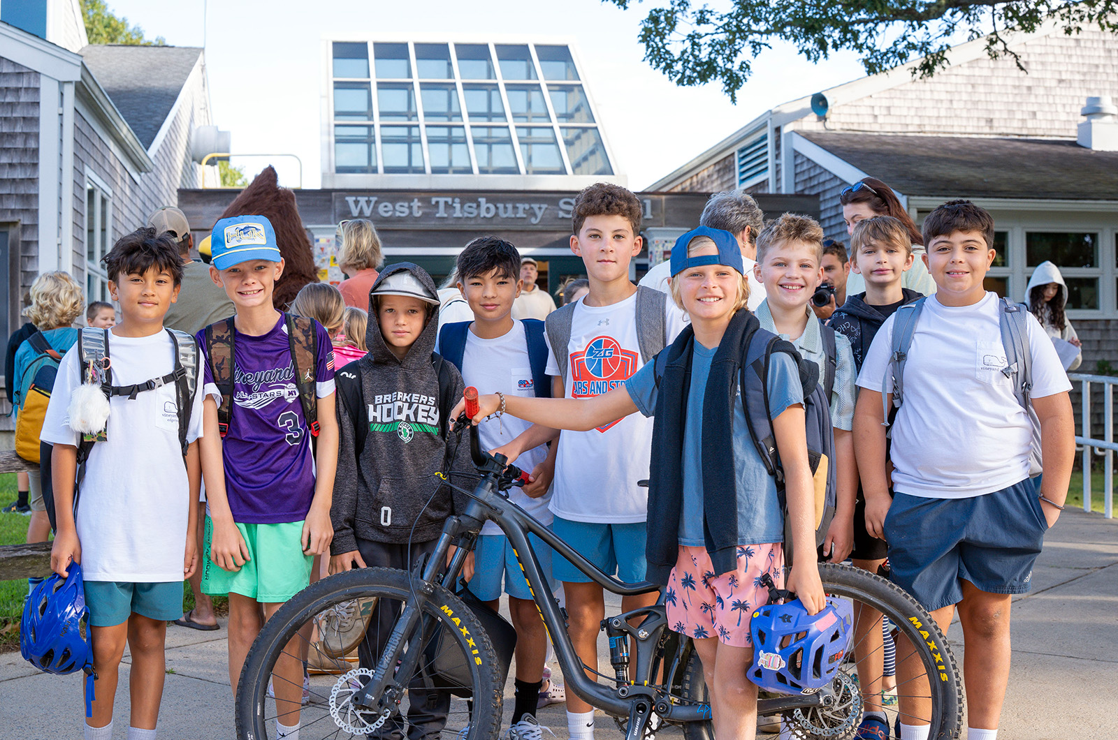 Friends gather at the West Tisbury school entrance.