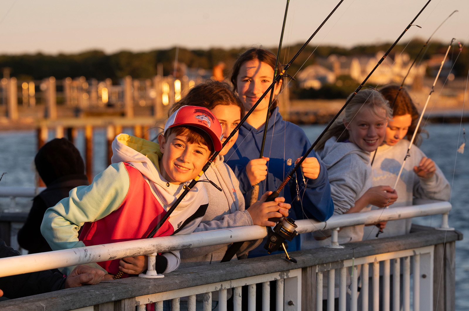 Friends and family help each other fins the big one.