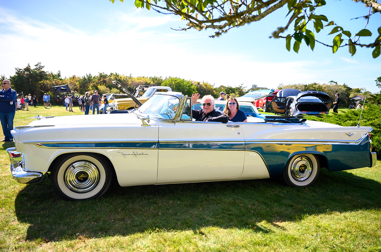 Gerry and Jen McDougal in their convertible.