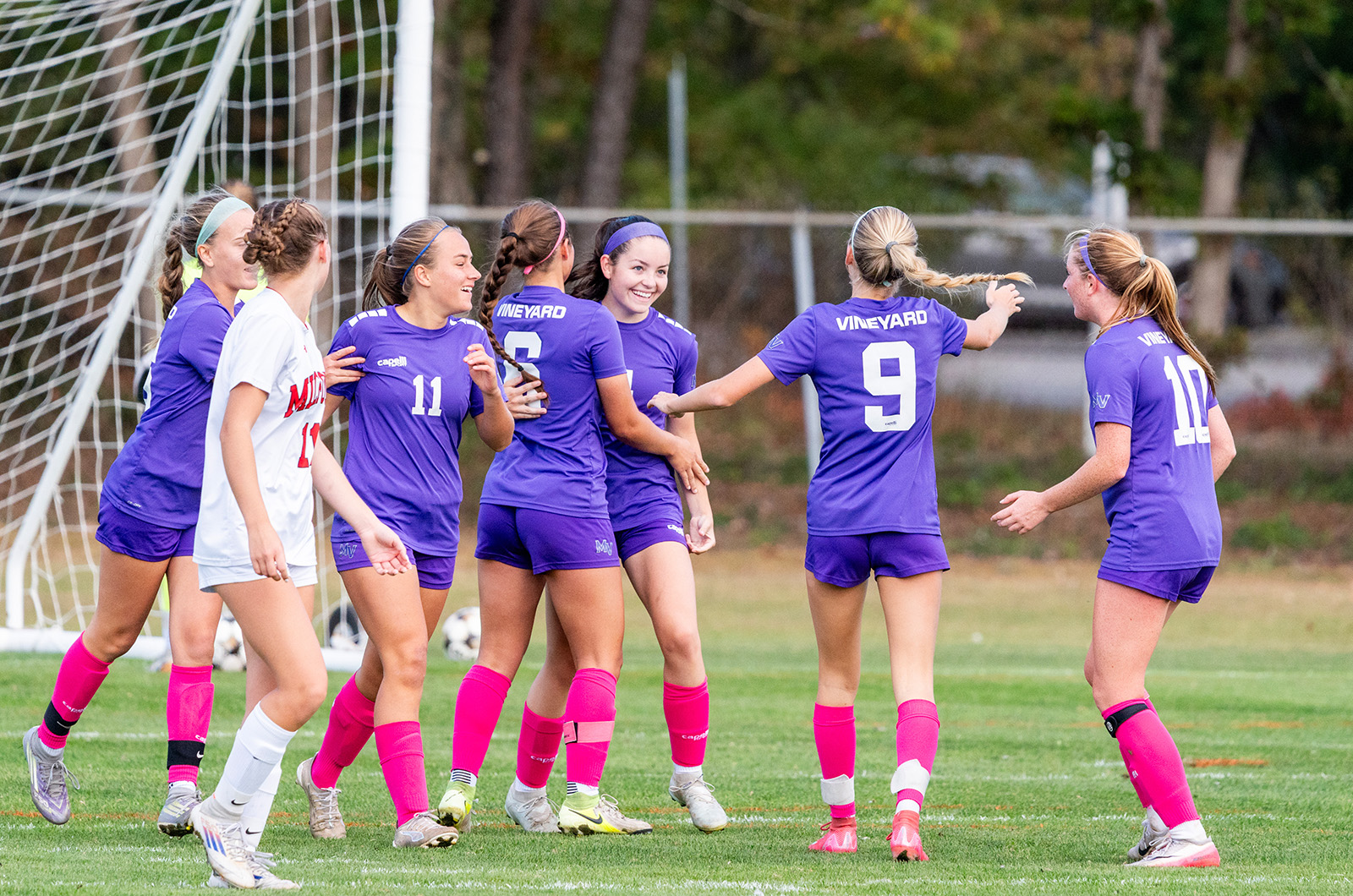 Ava Townes celebrates a goal with her teammates.