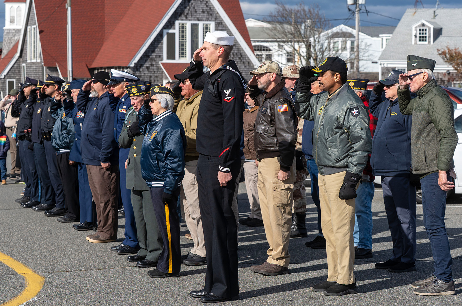 Veterans salute by the Oak Bluffs police station.