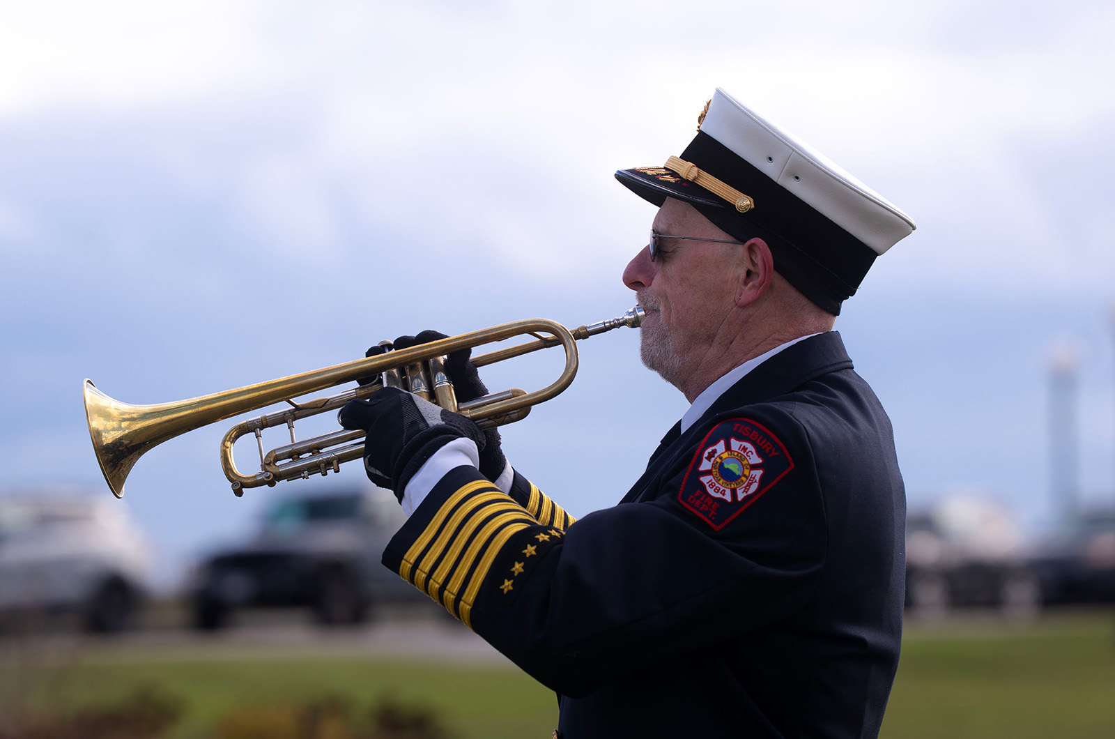 John Schilling plays Taps.