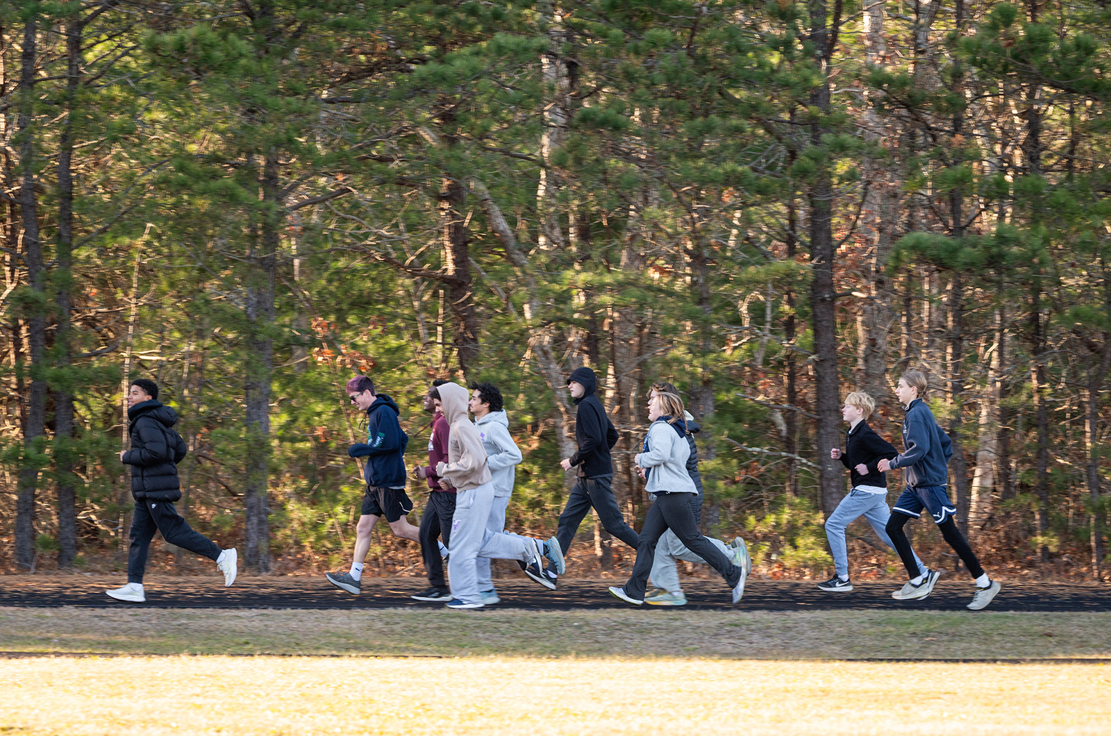 Track hopefuls make their way around.