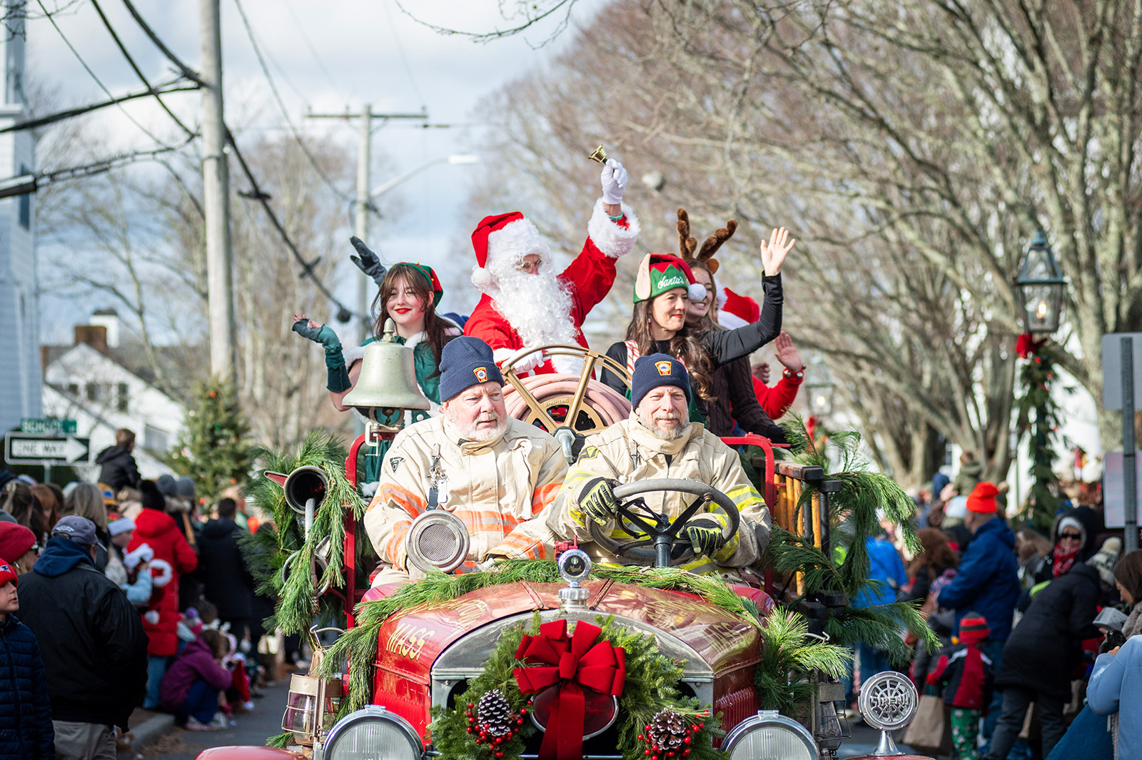 Santa rides along with Peter Shemeth and Scott Ellis with the Edgartown Fire Department.
