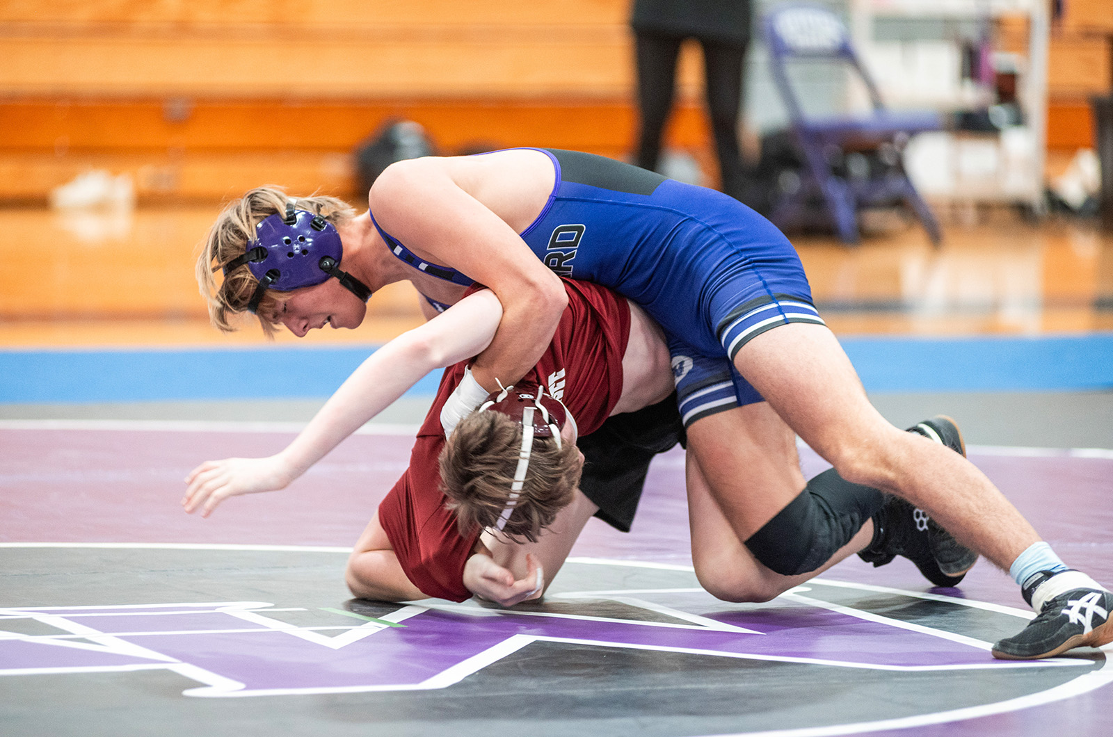 Odin Robinson cranks a half nelson.