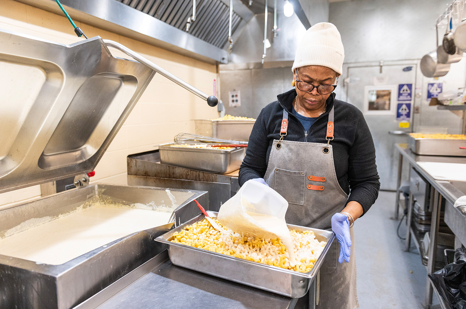 Lorraine Picard prepares the pasta alfredo.