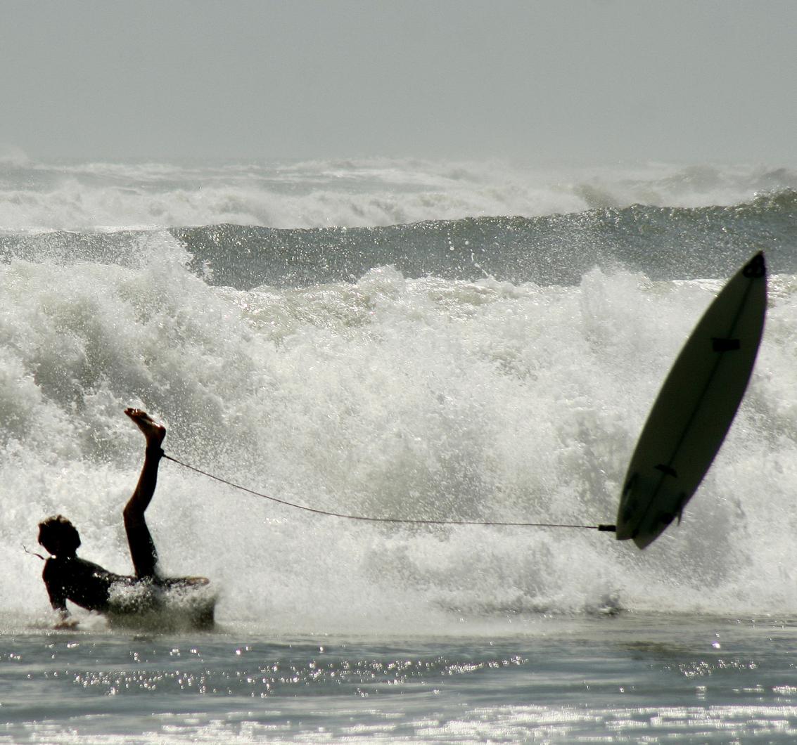 surfer wipes out