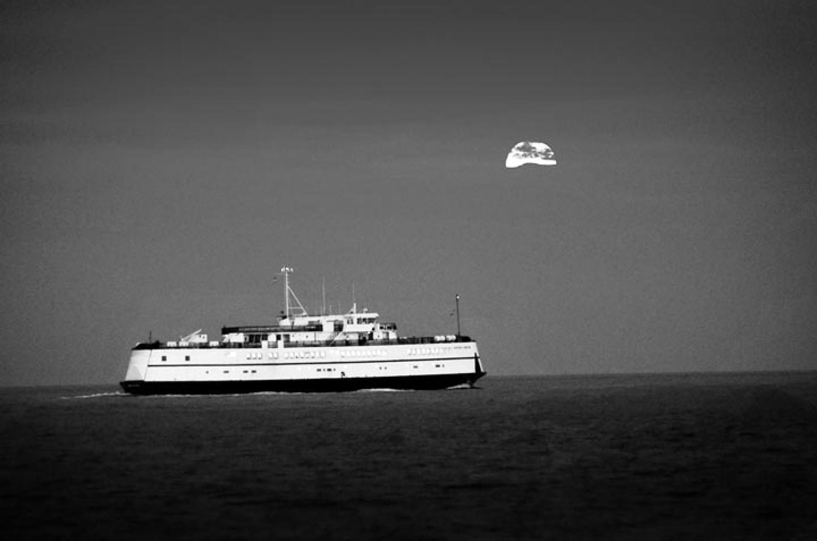 BW sunset ferry moon