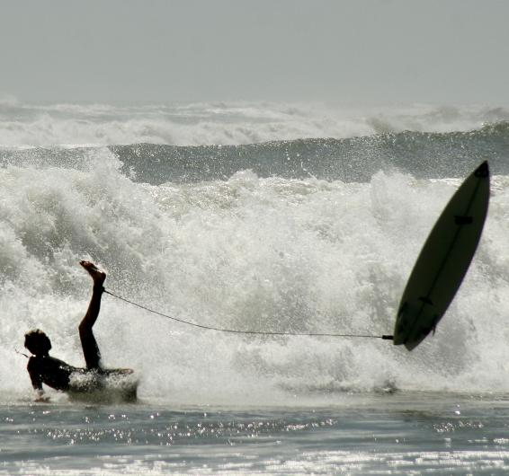 surfer wipes out