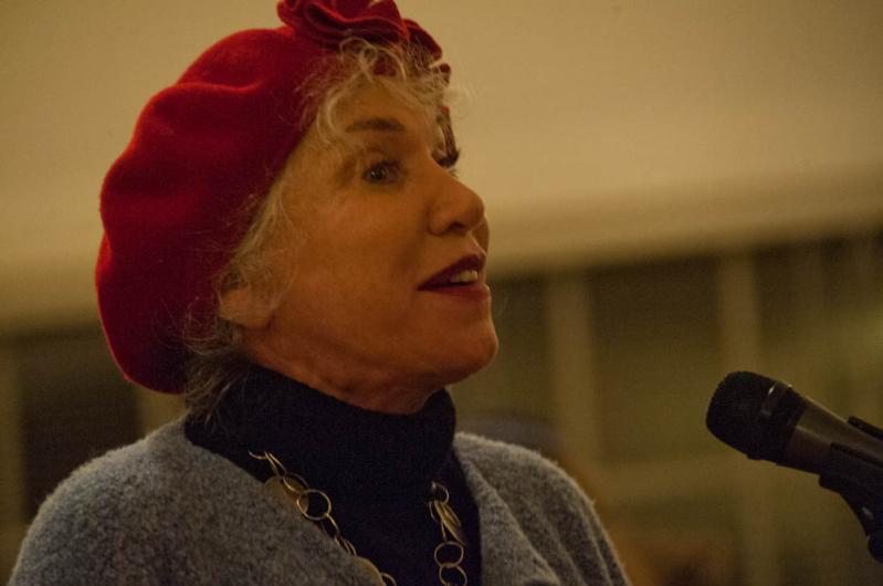 Ljuba Davis, leads in song.