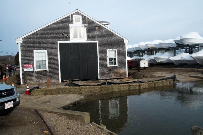 On March 11 work crews began lifting the old boat shop.