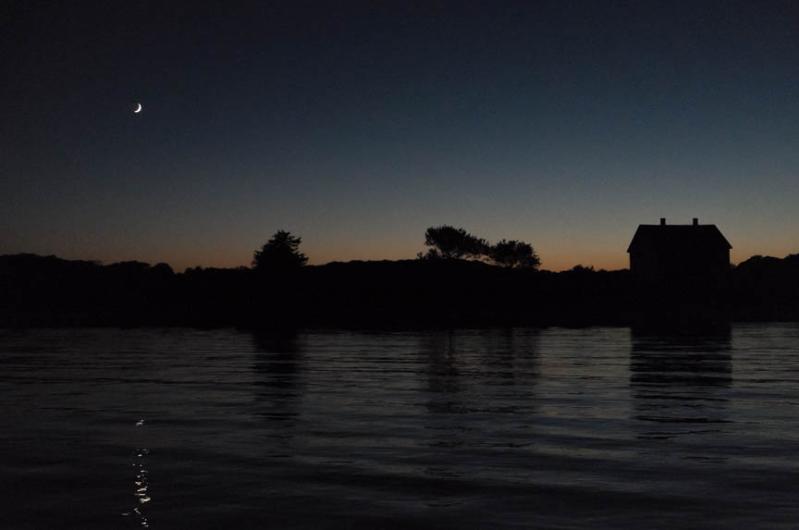 Setting crescent moon.