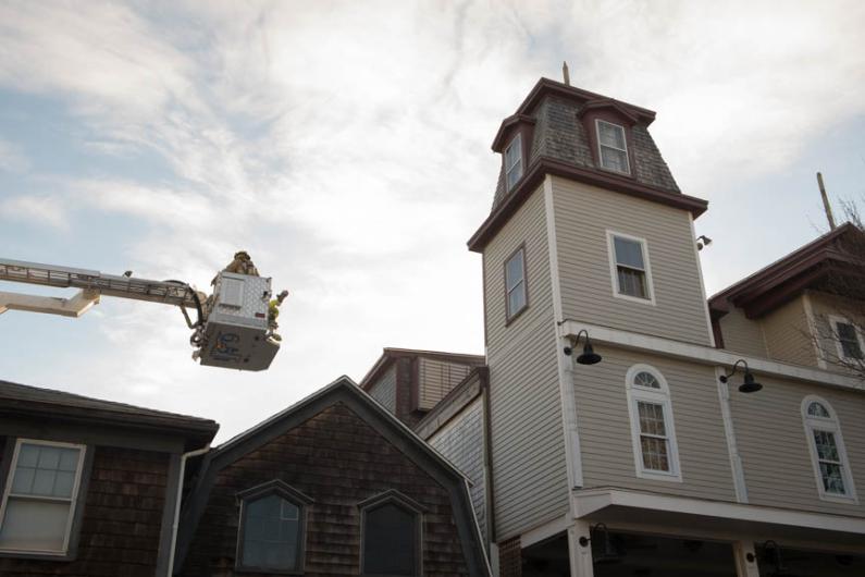 Firemen in the air.