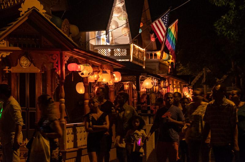 A gathering amid the lit lanterns.