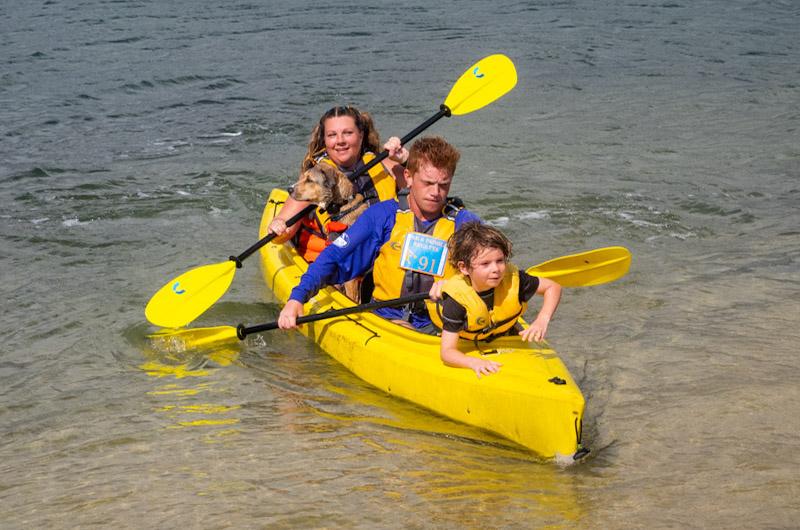  Devin and Kristen Araujo of Edgartown with dog Benny and Kian Stapleton at the bow.