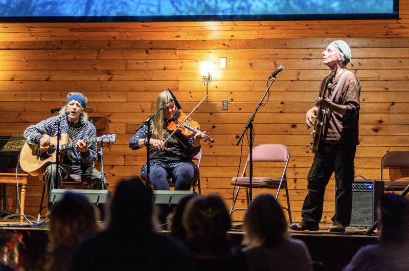 [l-r] Tristan Israel on guitar, Nancy Jephcote on vioiln, and Paul Thurlow on bass.