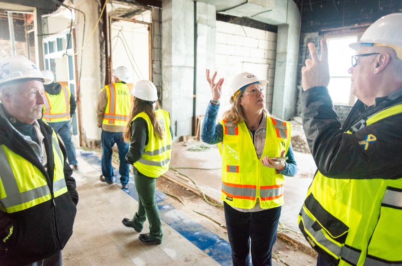 [l-r] Steve Brenner, Amy Houghton, Michael Owen discuss progress and possibilities on the third floor.